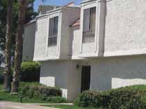 Repainting and repairs of older stucco condominium.